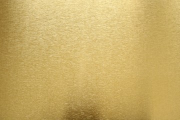Wall Mural - Texture of shiny old gold bar, abstract background, selective focus