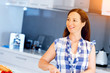 © Sergey Nivens - Beautiful woman standing in the kitchen
