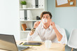 Joke, office, humor, people concept - handsome man chewing gum and thinking about something, huge bubble