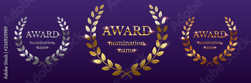 Fotografía Golden, silver and bronze award signs with laurel wreath isolated on purple background