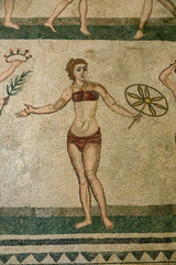 Ancient bikini girl of mosaic stones in Sicily