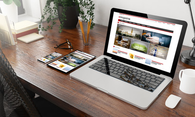 Wall Mural - devices e-magazine on wooden desktop