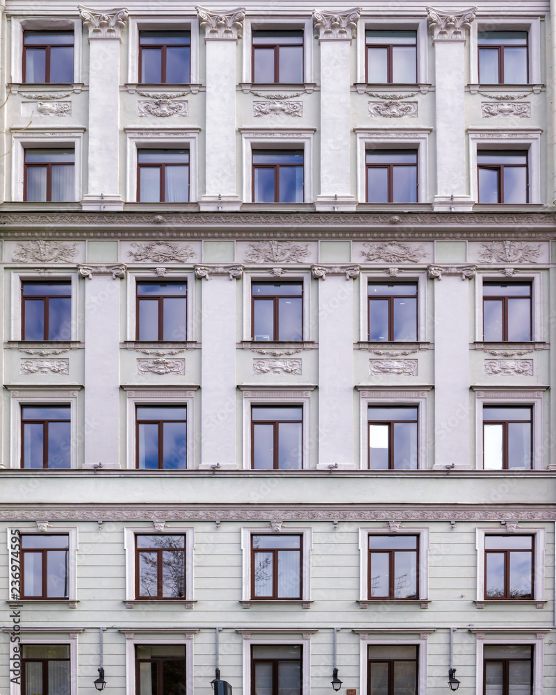 Vintage architecture classical facade apartment building decorated stucco  moulding in Enpire style. Front view Stock Photo | Adobe Stock, image size:800x1000