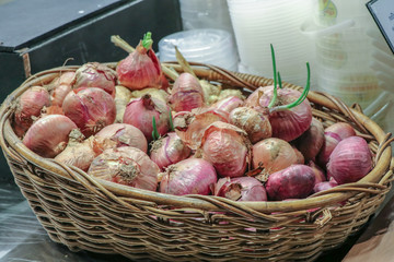 Wall Mural - Garlic and shallots close up background.Fresh red bulb onions frame.