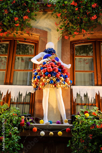 Christmas Decoration With Mannequin Wearing Dress Made Of Colorful