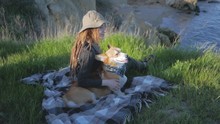 Young Female Traveler, Hiking With Corgi Dog In Mountains