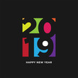 Happy New Year 2019 card in paper style. isolated colorful negative space on black background