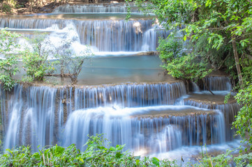  Waterfall flowing from the mountains at Huay Mae khamin waterfall National Park ,Kanchana buri in Thailand.