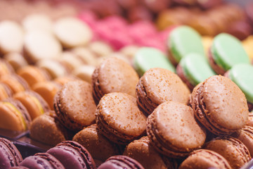 Wall Mural - Various delicious macarons on a showcase in a French shop.