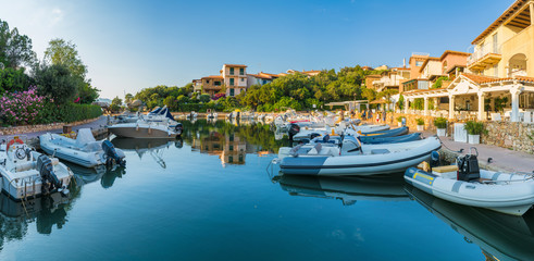 Wall Mural - view of harbor and village porto rotondo, sardinia island, italy