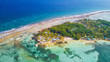 Aerial view of tropical island at Glover's Reef Atoll in Belize Barrier Reef