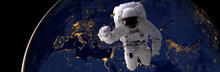 Astronaut Spacewalk At Night From The Dark Side Of The Earth Planet. Elements Of This Image Furnished By NASA D
