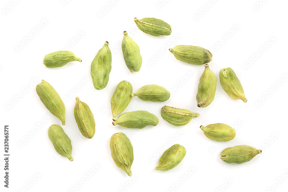 Green cardamom seeds isolated on white background. Top view. Flat lay - obrazy, fototapety, plakaty 