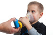 © Louis-Paul Photo - Close-up image little boy using inhaler for asthma.