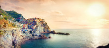 Seascape With Town On Rock Of Manarola, At Famous Cinque Terre National Park. Liguria, Italy