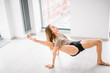 © alfa27 - young awesome happy woman developing flexibility. full length photo.yoga practise