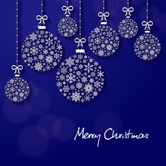 Wall Mural - greeting card with the words merry christmas. from above, stylish snowflake-shaped baubles hang on r