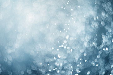 falling snow, abstract blue bokeh background