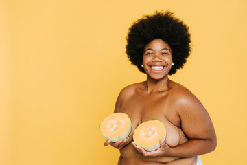 Wall Mural - Curvy African American woman with melons