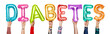 © Rawpixel.com - Hands showing diabates balloons word