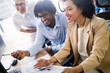 © NDABCREATIVITY - Group of successful business people at work in office