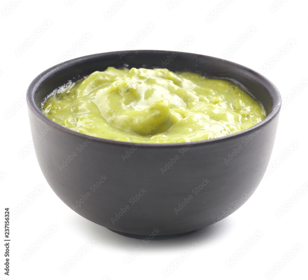 Tasty sauce in bowl on white background