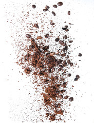 Coffee powder and coffee beans splash or explosion flying in the air