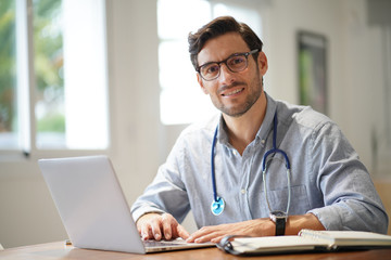  Handsome doctor in office