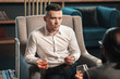 © zinkevych - Young handsome promising lawyer drinking whisky with client