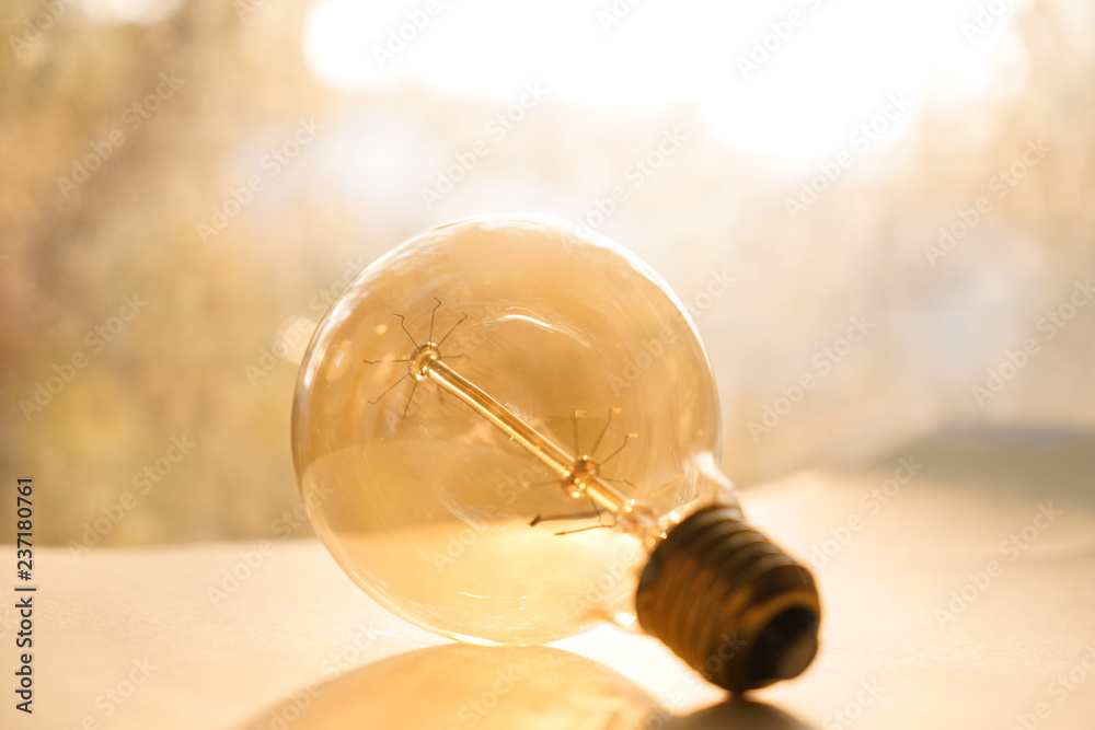Retro light bulb on table