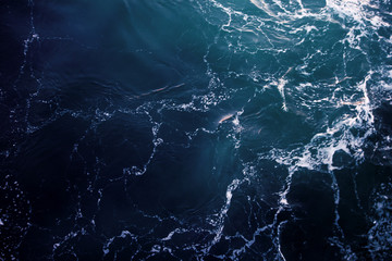 ocean view from the top. blue-green waves, storm, sea surface.