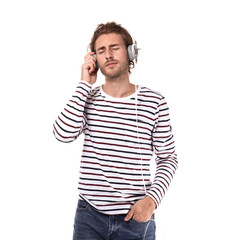 Sticker - Young man listening to music on white background