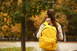 © Pixel-Shot - Cute girl with backpack going to school