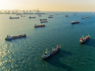 Oil ship tanker transportation crude oil park on the sea waiting unload oil to refinery.