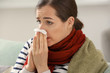 © Pixel-Shot - Young woman ill with flu at home