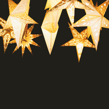 Star-shaped Paper Lantern Against Night Sky - Star Lampions On Black Background With Copy Space