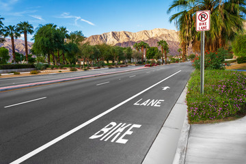 Bike lane on suburban street with road sign