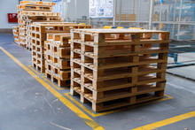 Stacked Wooden Pallets At A Storage