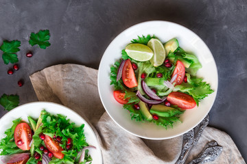 Wall Mural - Fresh salad in bowls