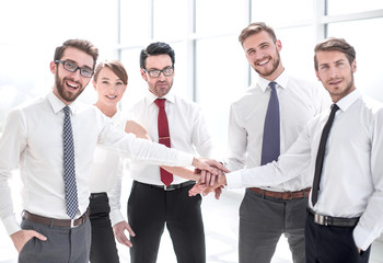 successful business team holding hands