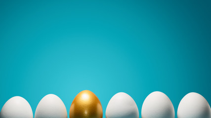 Concept of individuality, exclusivity, better choice. One golden egg among white eggs on blue background.