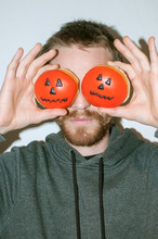 Young Man With Halloween Donuts
