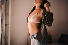 Anonymous Woman In Underwear Dressing Up