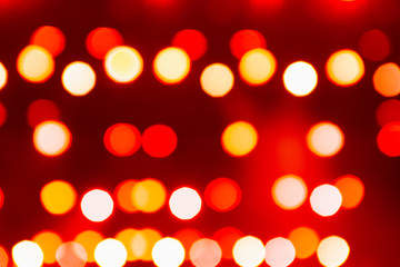 Wall Mural - Light bokeh. Abstract blurred christmas background. Color circles in the lens blur zone.