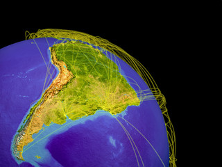 South America from space with trajectories representing global communication, travel, connections.