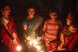 © Dream Lover/Stocksy - Teenage girls and Indian women lighting sparkle and celebrating