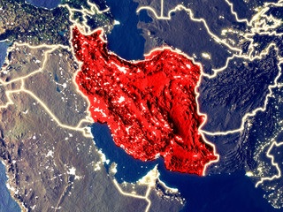 Wall Mural - Iran from space on Earth at night. Very fine detail of the plastic planet surface with bright city lights.