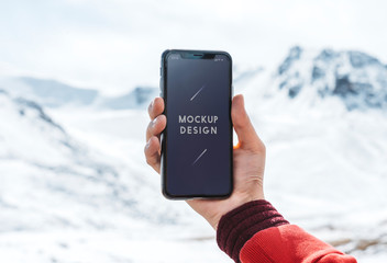 mobile phone mockup design by the himalaya mountains
