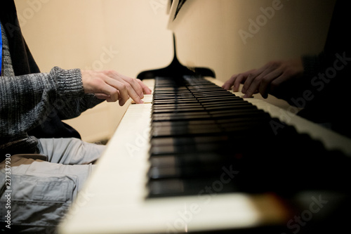 Fotografie, Obraz Piano keys ,side view of instrument musical tool.