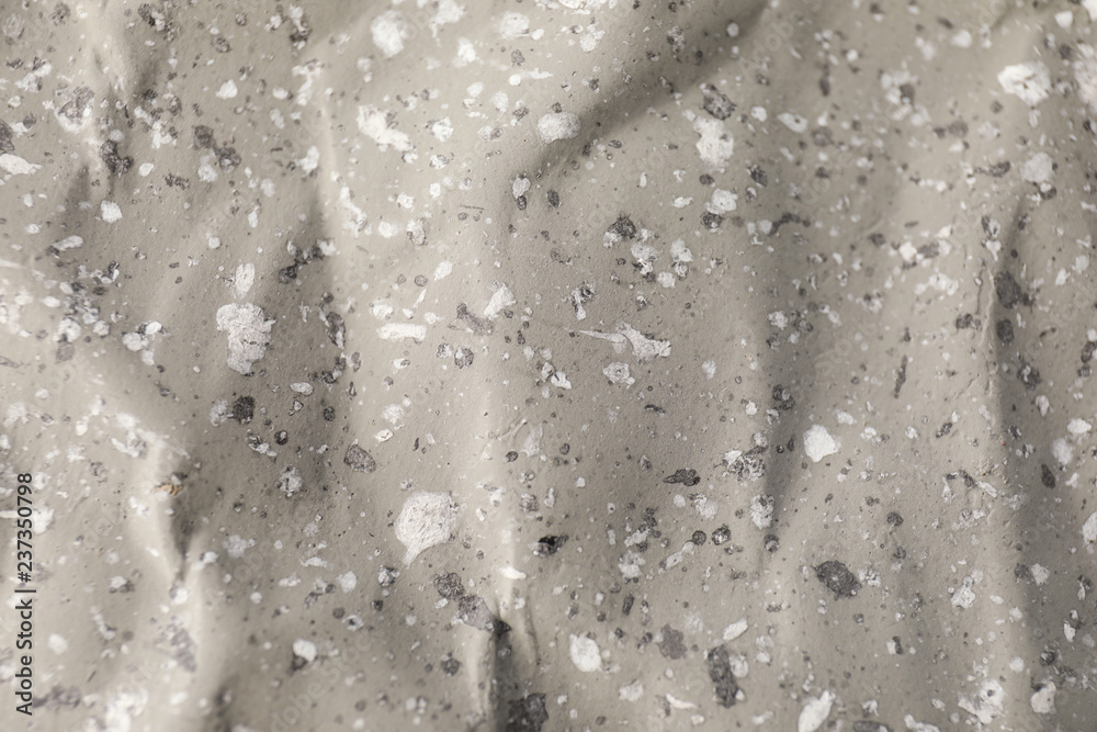 Crumpled grey paper, closeup
